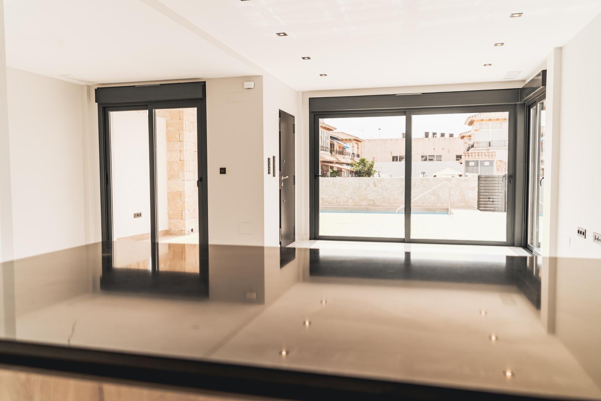 Obra nueva - Villa -
Orihuela Costa - Punta Prima